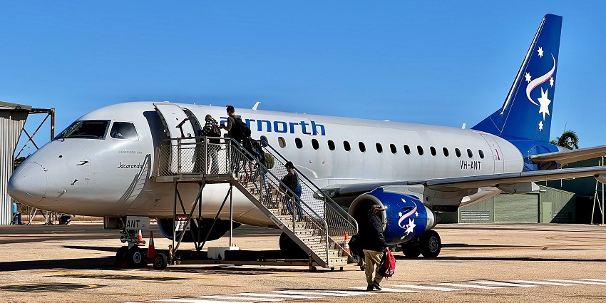 Passengers boarding a flight on the Broome airport which is close to Cable Beach.