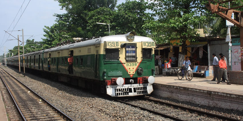 A picture of a train approaching a railway station near the Nehru Children's Museum