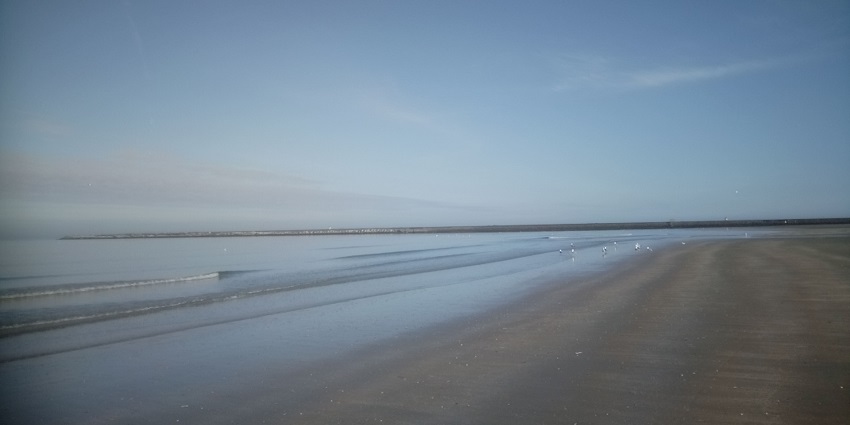 Popular beach with dunes, perfect for walks and outdoor activities.