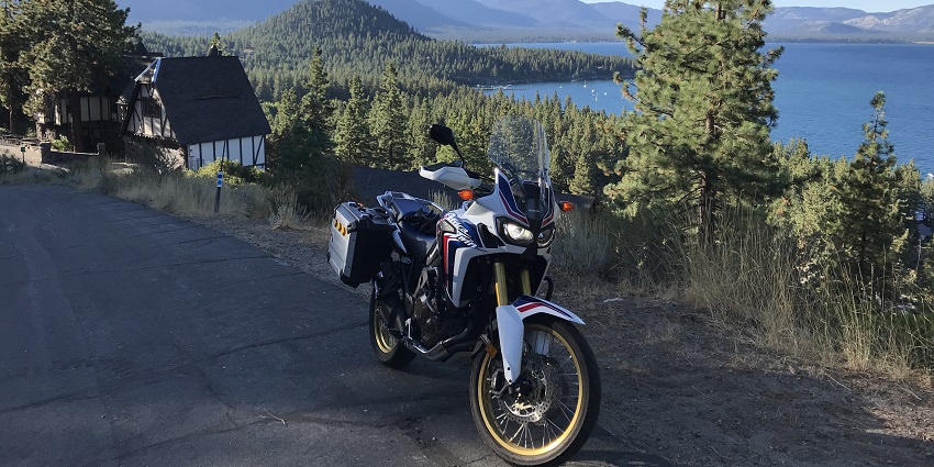 A motorcycle standing on a road around the Lake Tahoe in California, USA.
