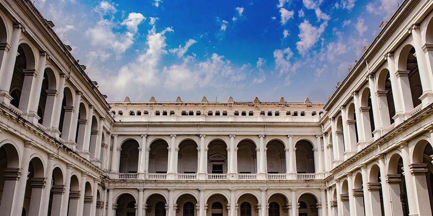 A picture of the Indian Museum in Kolkata, featuring its architecture and grand entrance.