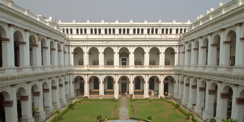 An exterior view of the Indian Museum, a grand colonial building in Kolkata, India.