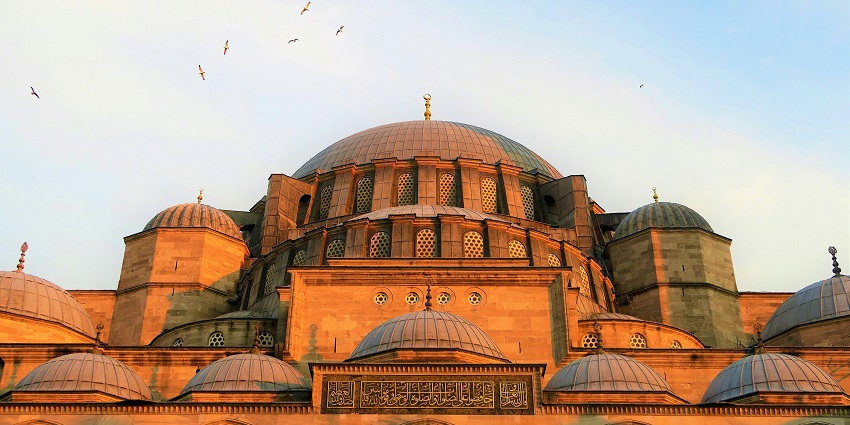 Historic city offering diverse attractions, including mosques and palaces.