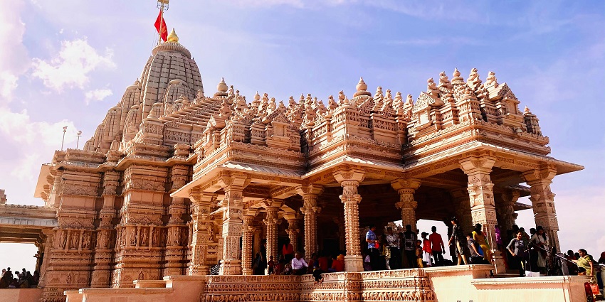 An image of brown concrete columns of a famous temple in California with intricate architectural details.