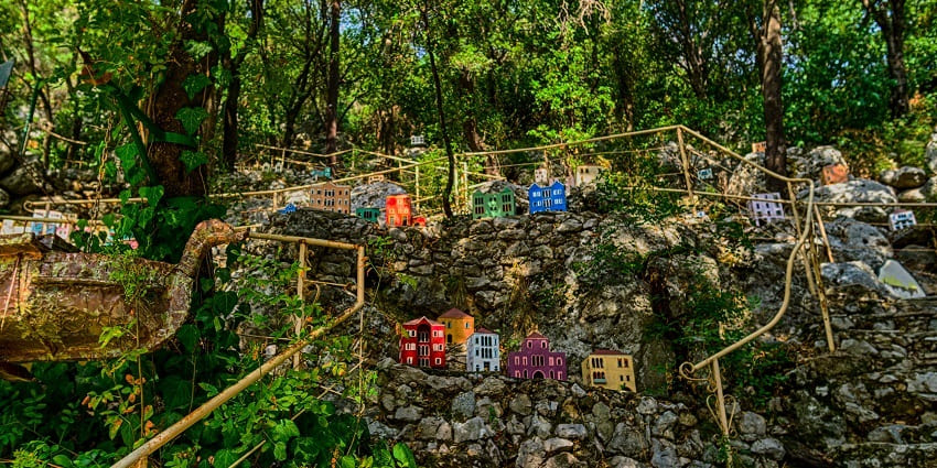 Jeita Grotto is one of the famous tourist places in Lebanon with stalactites, stalagmites, and boat tours.