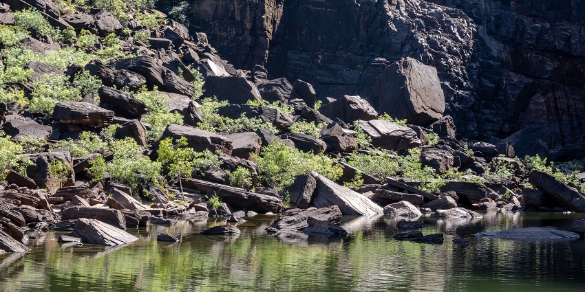 Serene environment at the base of the falls near Kakadu National park