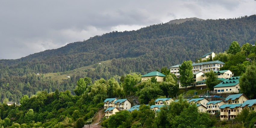 Historic town serving as a base for pilgrimage and trekking.