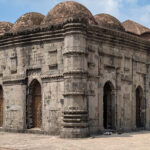 An image of Kadam Rasul Mosque in Gau showcasing its historical and spiritual significance.