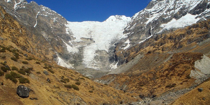 Peaceful trail leading to breathtaking glacier and mountain views.