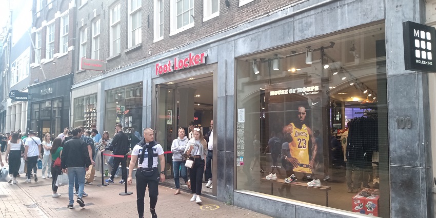 Shopping in Amsterdam street offering popular stores, boutiques, and cafes.