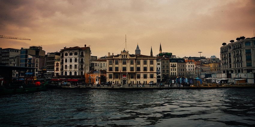 Vibrant area with waterfront dining, cultural attractions, and scenic views.