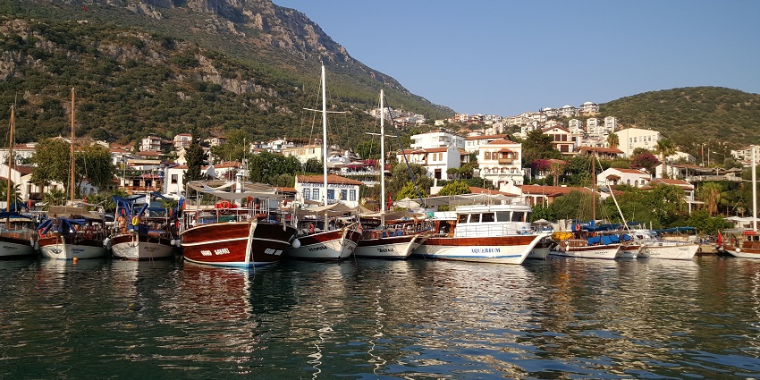 Seaside town offering Mediterranean beaches, ancient ruins, and diving spots.