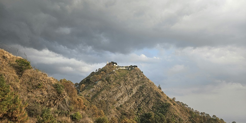 view of hilltop from another hilltop at kasauli for every traveller to visit and explore.