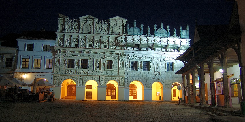 Kazimierz kamienice at night with detailed architecture and yellow lighting in its halls