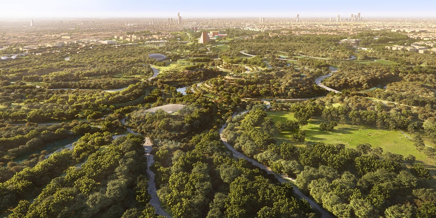 A view of an expansive green park offering recreational activities and serene landscapes.
