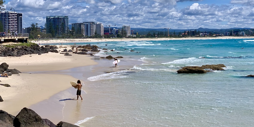 Surfers seen on the famous Kirra Beach near Coolangatta Beach in Australia