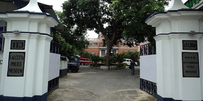 Entrance view of Calcutta Police Museum, colonial mansion with red brick