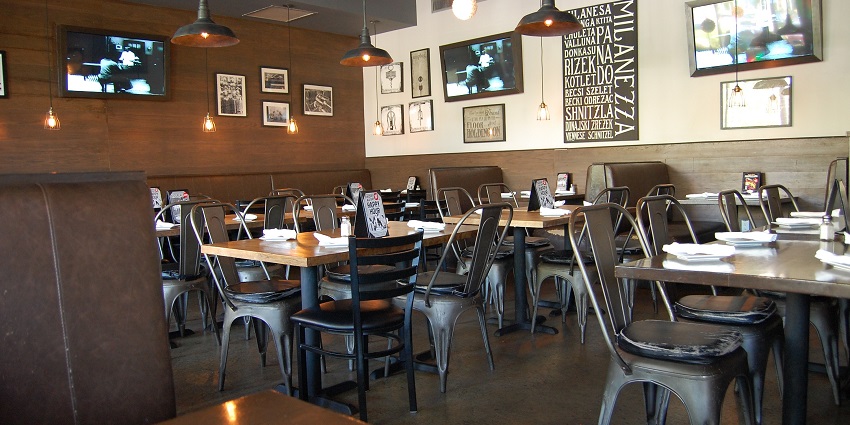 Image of a cozy café and bar serving drinks, food, and music