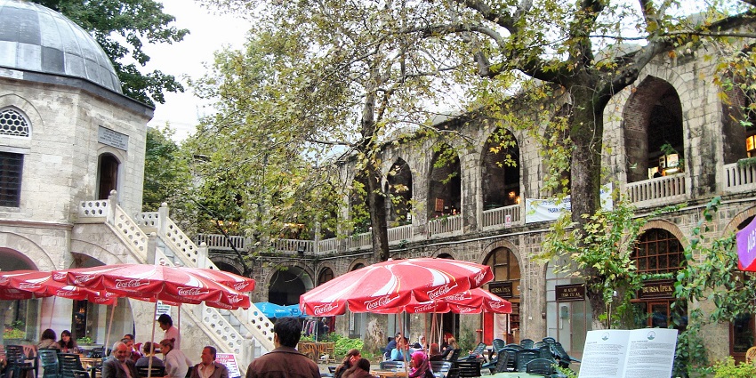 Historic market in Bursa offering textiles, antiques, and local crafts