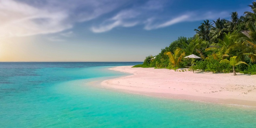 An image of a serene beach, one of the Mexico beaches surrounded by turquoise water.