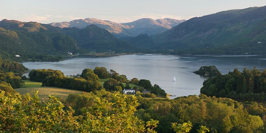 Greenery and peace at Lake District that offers pine woodland and verdant pastures.