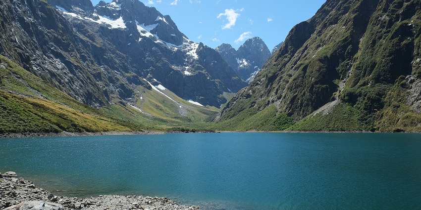 Lake Marian near Milford Sound Waterfalls rewards hikers with views of glacial waters