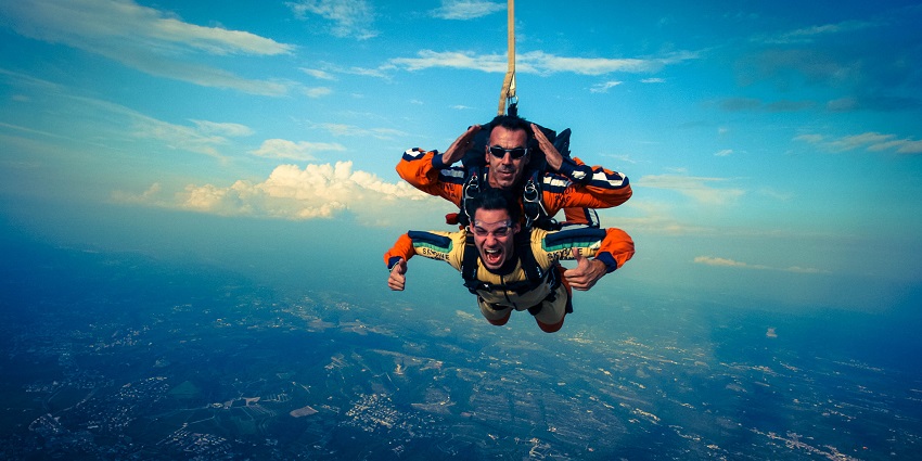 Selfie in the sky taken by tandem skydiver while skydiving in New Zealand