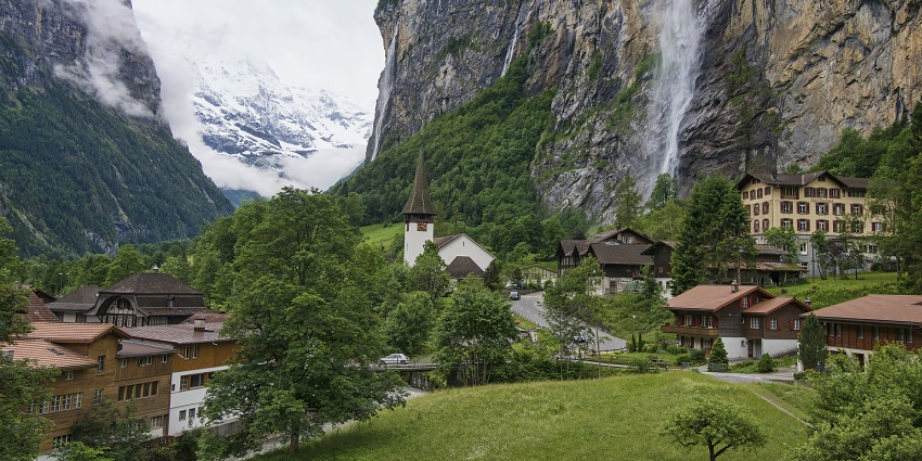 Valentines Day in Switzerland valley with dramatic waterfalls and alpine meadows