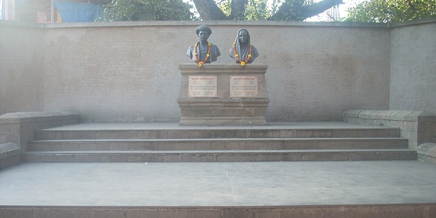 Image of Statues at Mahatma fule vada, Pune, India surrounded by green trees