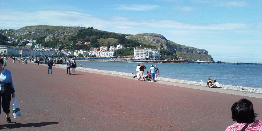 Time to soak up at Llandudno and luxurious villas on the hillside of coastline.