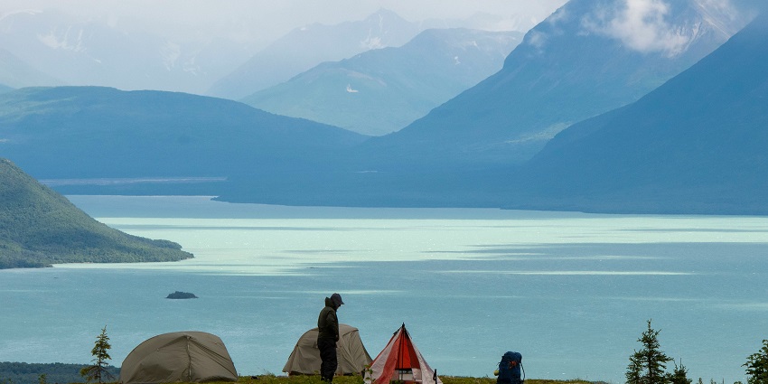 An image of camping spot at Dumpling Mountain with tents and backpacker at Katmai