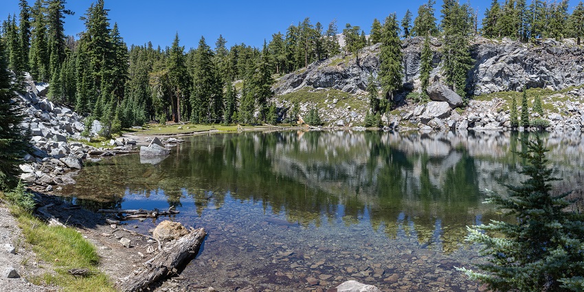 A stunning view of Terrace Lake in Lassen Volcanic National Park, surrounded by nature.