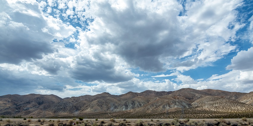 An image of the mountains and clear blue sky in the Forest.