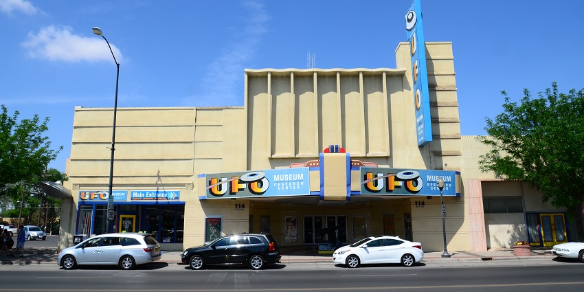 An entrance of the UFO Museum in Roswell, New Mexico, with distinctive signage and decor.