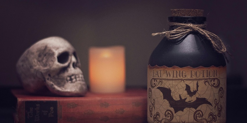 A visitor examining exhibits at the Warren’s Occult Museum, filled with paranormal artefacts.