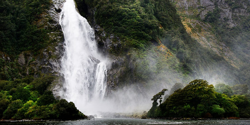 Feel the mist and magic of Milford Sound’s cascading waterfalls
