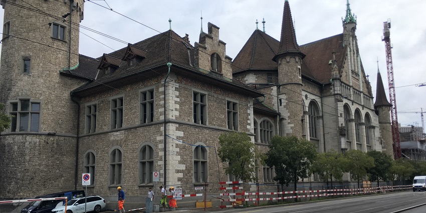 The Swiss National Museum in the heart of Zurich HB with scenic riverside views.