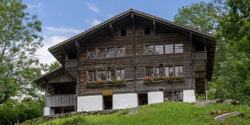 Image of Swiss Open-Air Museum amid a stunning Alpine backdrop during day time