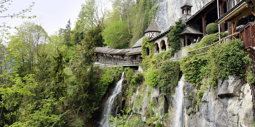 St Beatus Caves near Lake Thun with waterfalls and walkways.