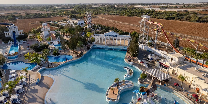 An image of a water park in Lucknow showcasing lush gardens and attractions.