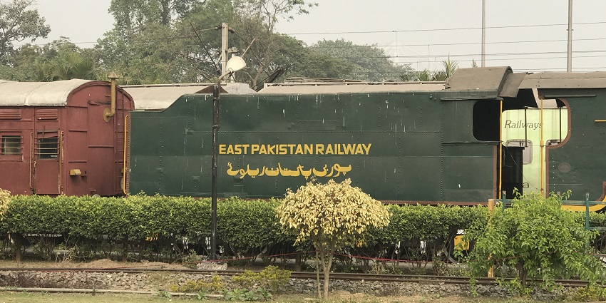 A picture of the entrance of Rail Museum Howrah, with visitors exploring the exhibits.