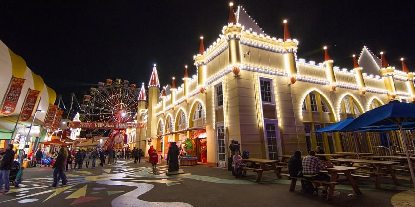 Luna Park, one of the places to visit in Sydney, is situated at the edge of Sydney Harbour.