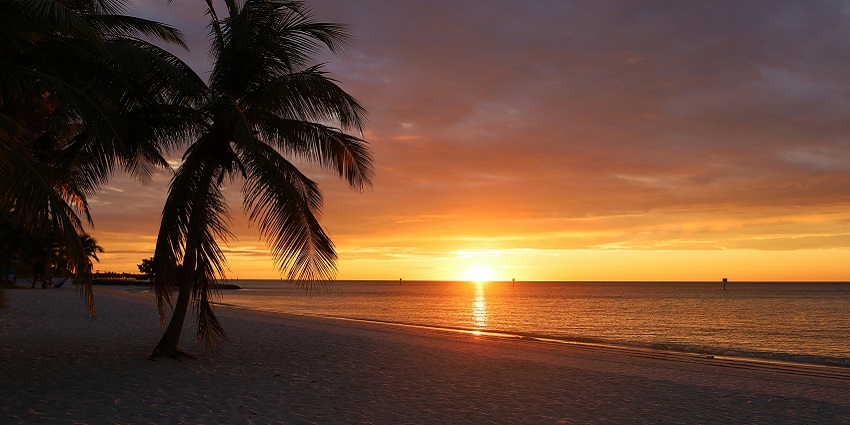 A view of Sunset in Florida west with beautiful hues of orange and pink near Dry Tortugas.