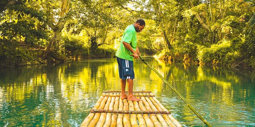 Experience the serene beauty amidst forests at Martha Brae River