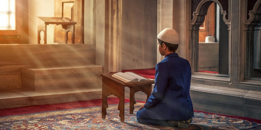 An image of a child praying in Masjid Manhattan, a famous mosque in the USA