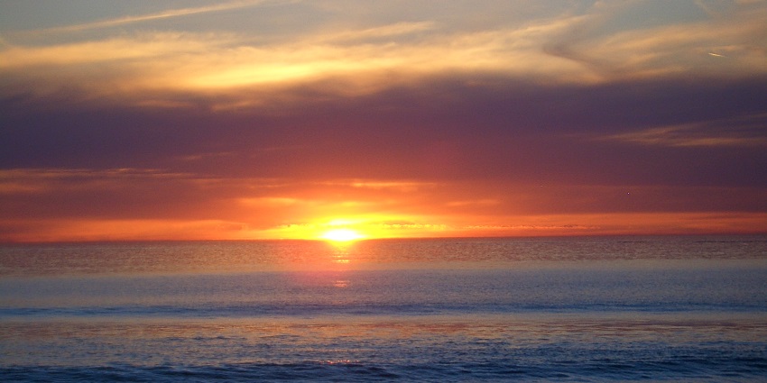 Hues of crimson while sunset at Maslin one of the best Beaches in Adelaide, Australia