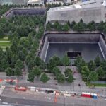 An aerial view of the 9/11 Memorial and Museum, showcasing the Twin Towers' footprints.