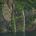 Discover serenity and power in the cascading waters of Milford Sound Waterfall