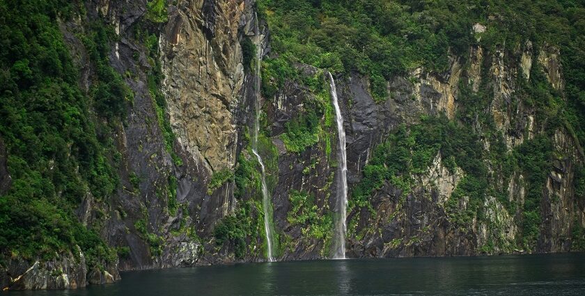 Discover serenity and power in the cascading waters of Milford Sound Waterfall