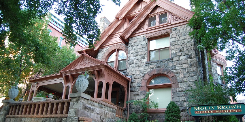 A view of a brown house, a popular tourist attraction near Denver Art Museum